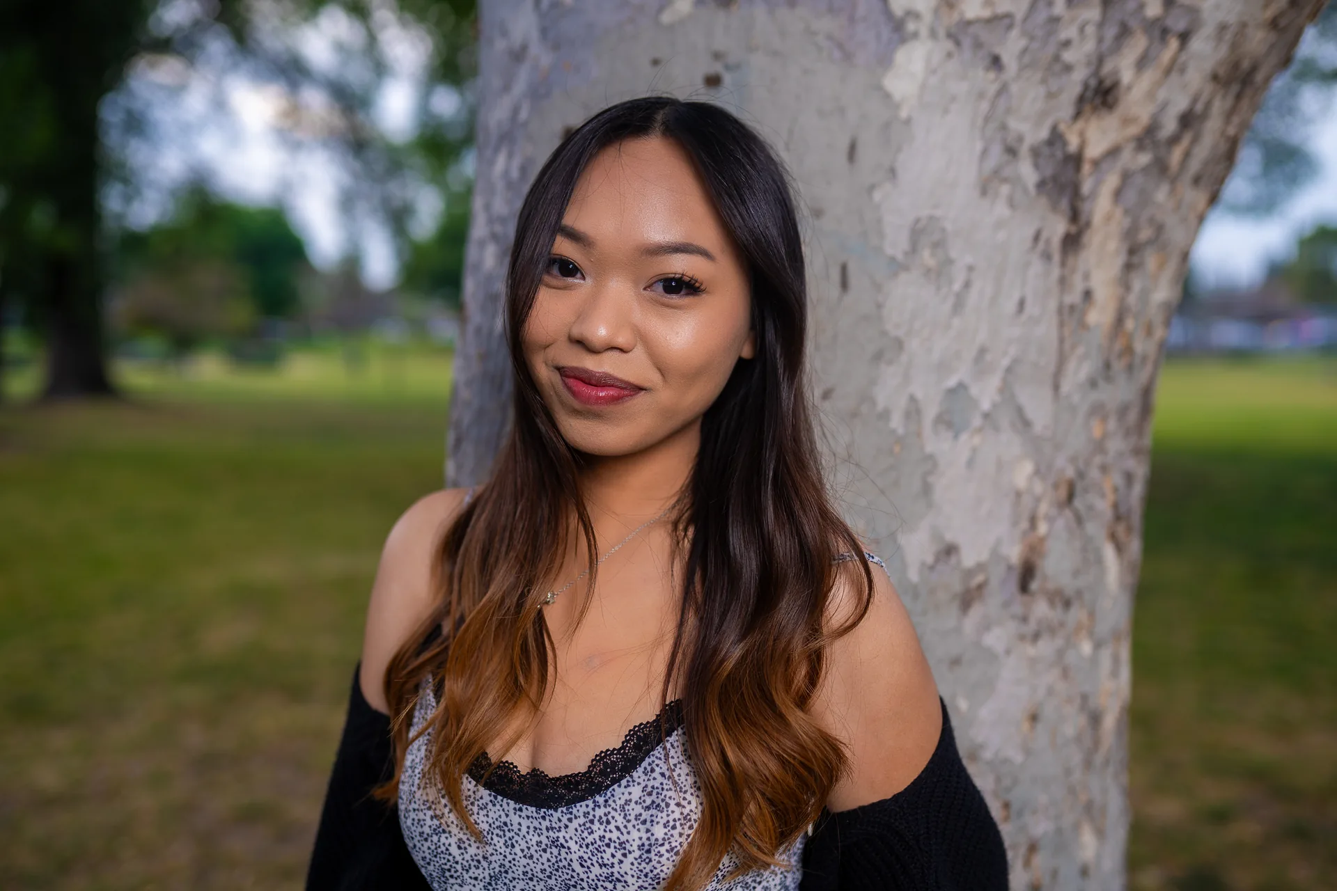 Outdoor portrait of a woman photographed under trees in Los Angeles